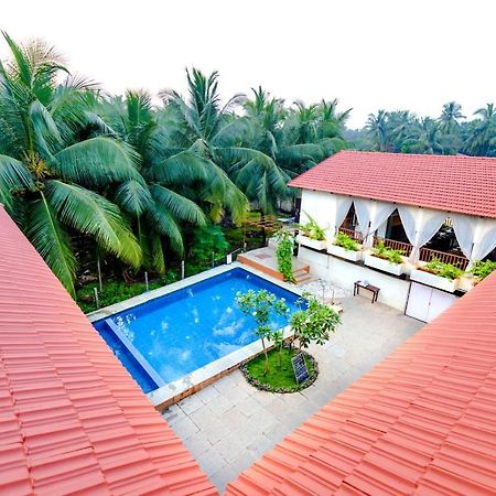 Bougainvillea Hotel Alibag Bagian luar foto